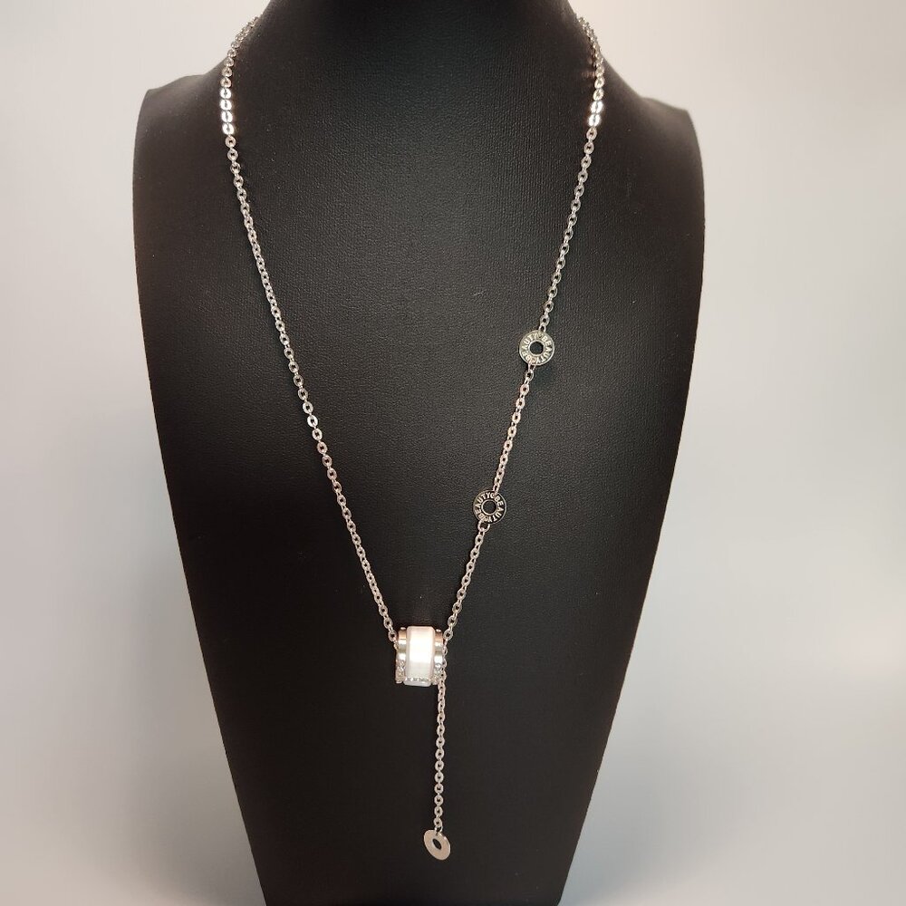 New stainless steel necklace with white enamel and zirconia pendant
